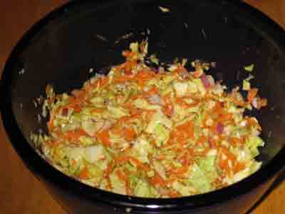 Greek cabbage salad with lemon and olive oil dressing.