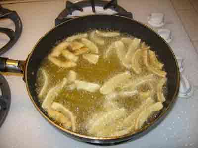 Squid frying in lots of oil.