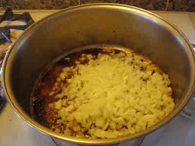 Saute onions for greek food recipe moschari me fasolakia, beef stew with green beans