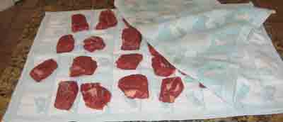 Drying the meat for greek food recipe moschari me fasolakia, beef stew with green beans