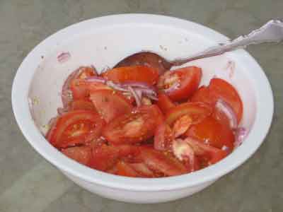 Greek tomato salad, ntomatosalata, dressed with olive oil.