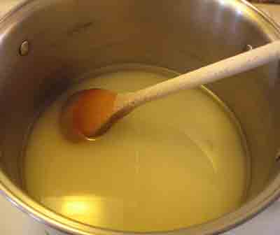 Boiling syrup to thicken it for the greek recipe sikalaki gliko, fig spoon sweet.