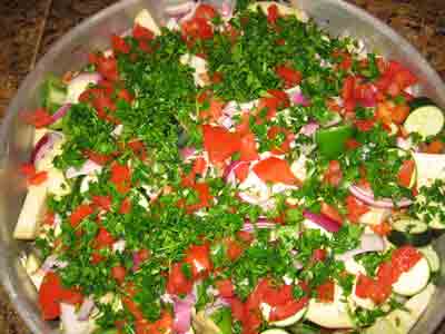 Top with tomatoes and parsley.
